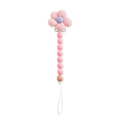 Attache tetine securisee et glamour rose
