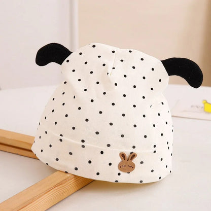 Bonnet bebe doux et chaud points noirs