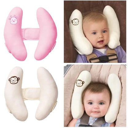 Cale tete bebe forme papillon sur le cou de bebe