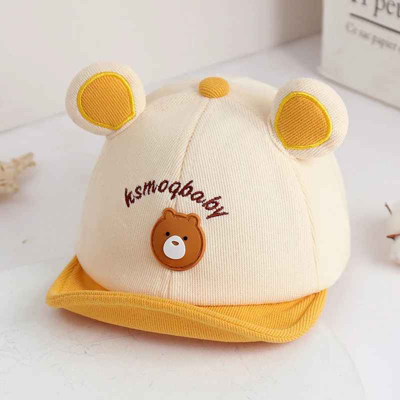 Casquette bebe protection ajustable jaune