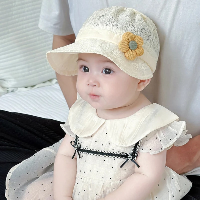 Chapeau bebe anti UV reglable blanc avec noeud jaune