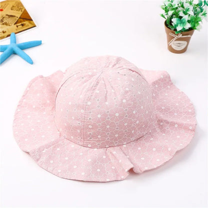 Chapeau bebe fleuri large bord rose