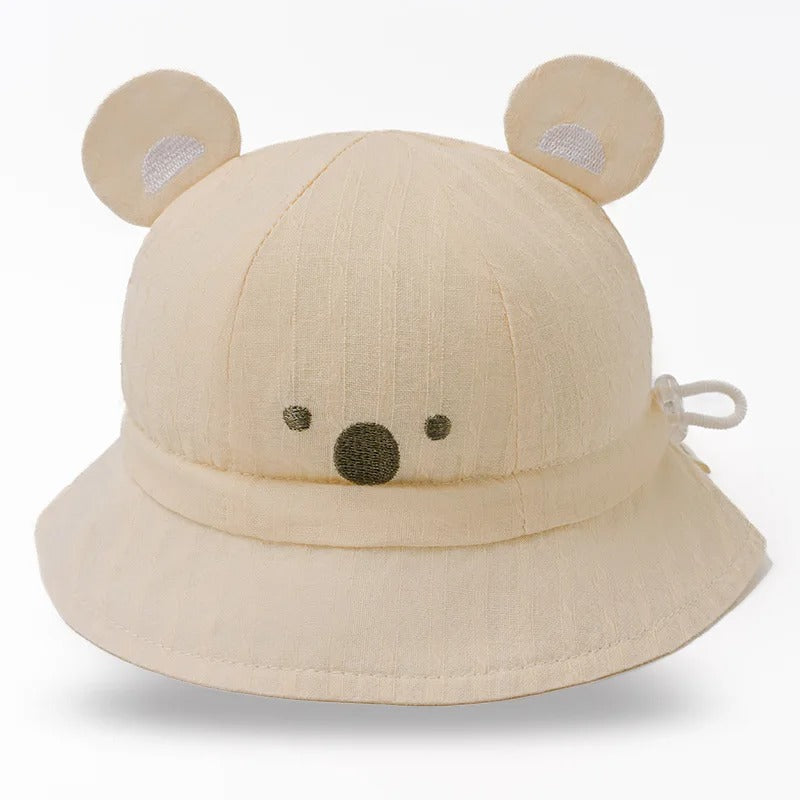 Chapeau bebe protecteur trois saisons beige
