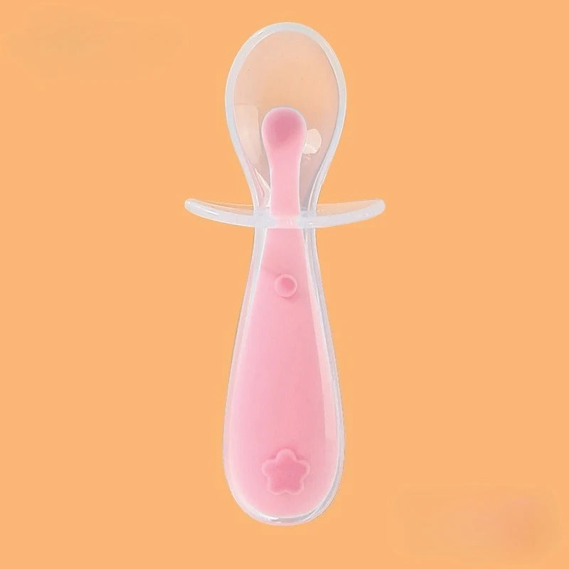 Cuillere bebe en silicone couleur rose 