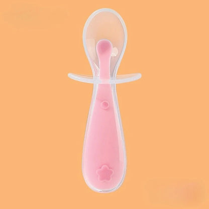 Cuillere bebe en silicone couleur rose 