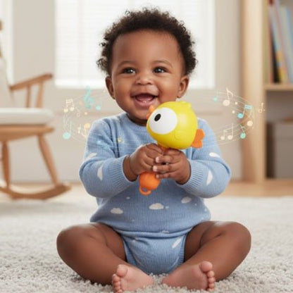 Hochet bebe sensoriel bebe est assis