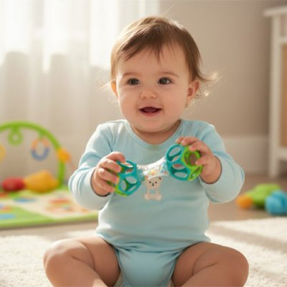 Hochet bebe sensoriel colore bebe est assis