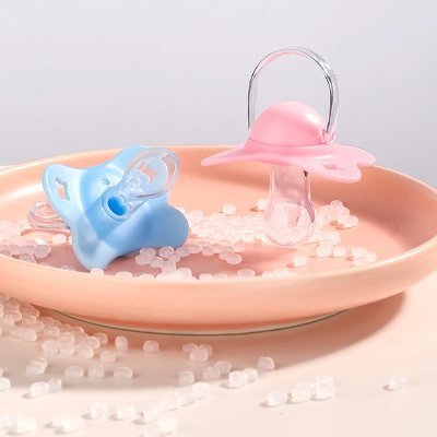 Tetine bebe forme papillon rose et bleu