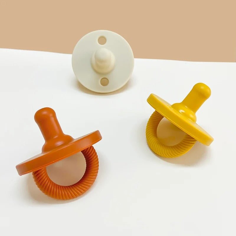 Tétine bebe silicone sans BPA couleurs vives